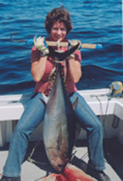 woman holding tuna